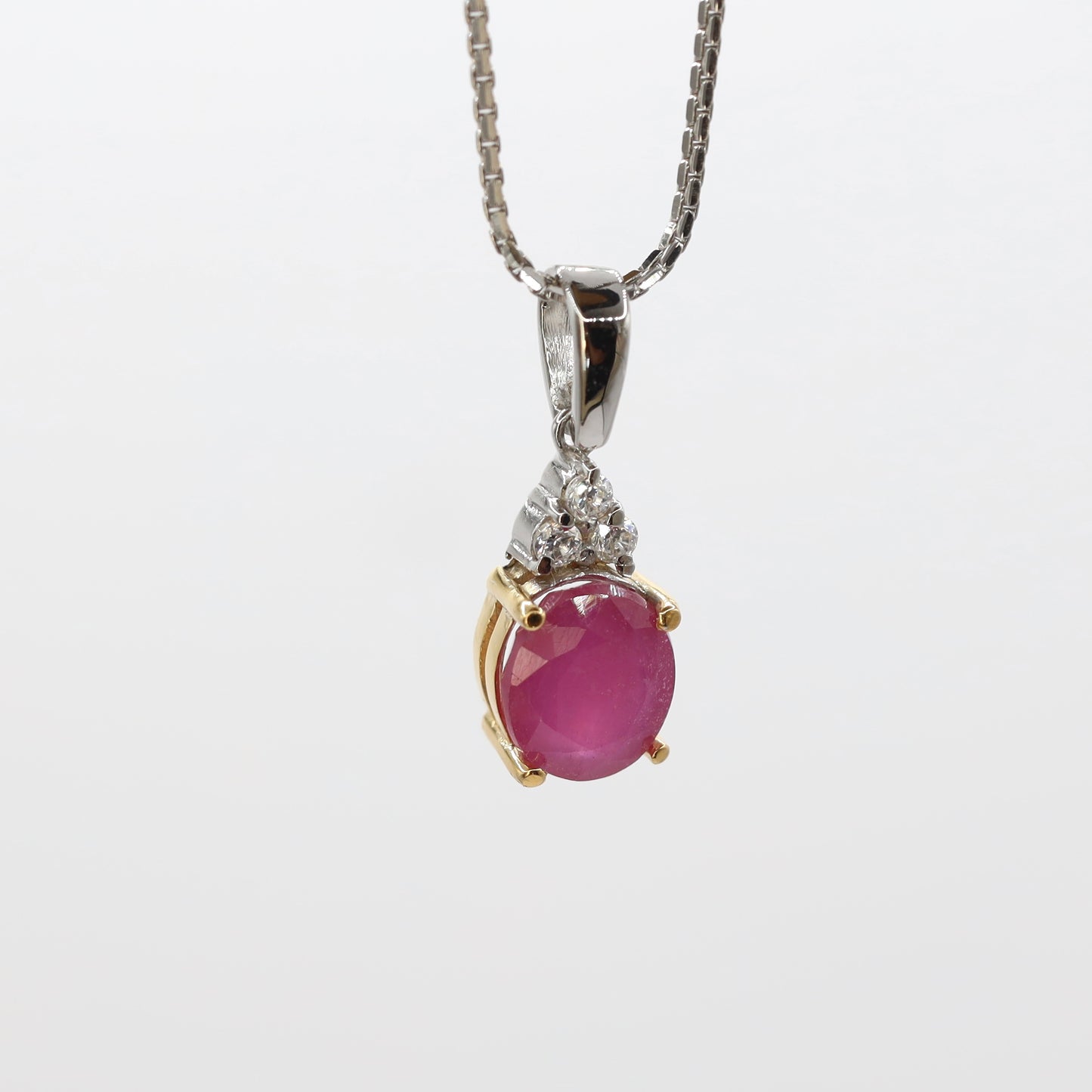 handmade ruby pendant with 9k gold and silver 925